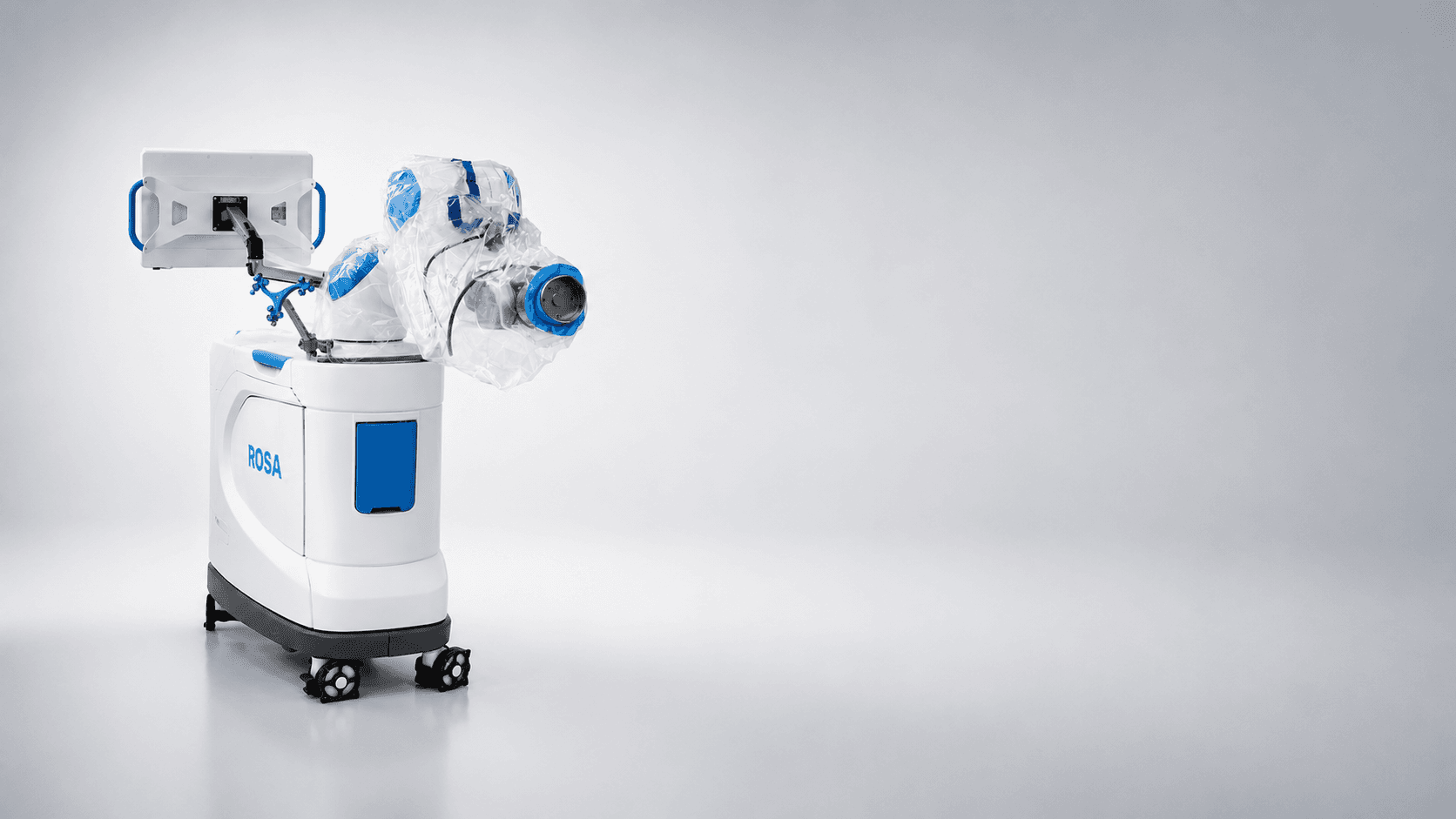 The ROSA robotic surgical system, draped and ready in the operating room
