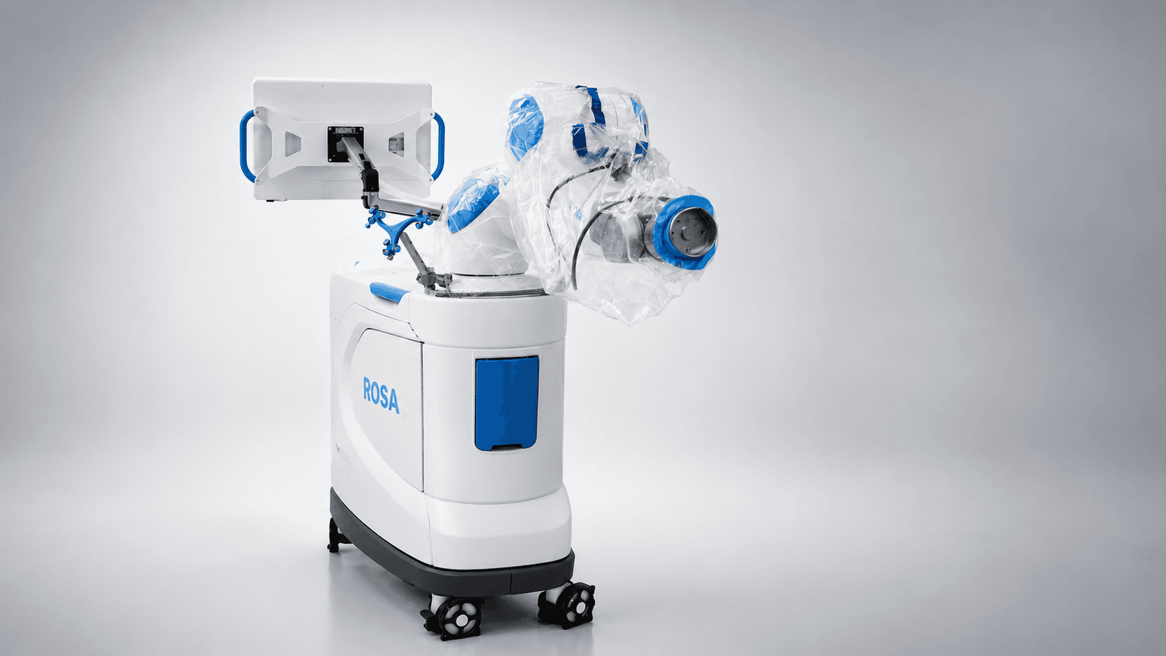 The ROSA robotic surgical system, draped and ready in the operating room
